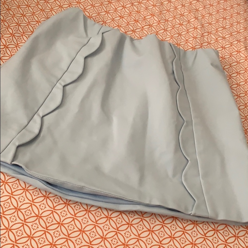 A scallop style mini skirt